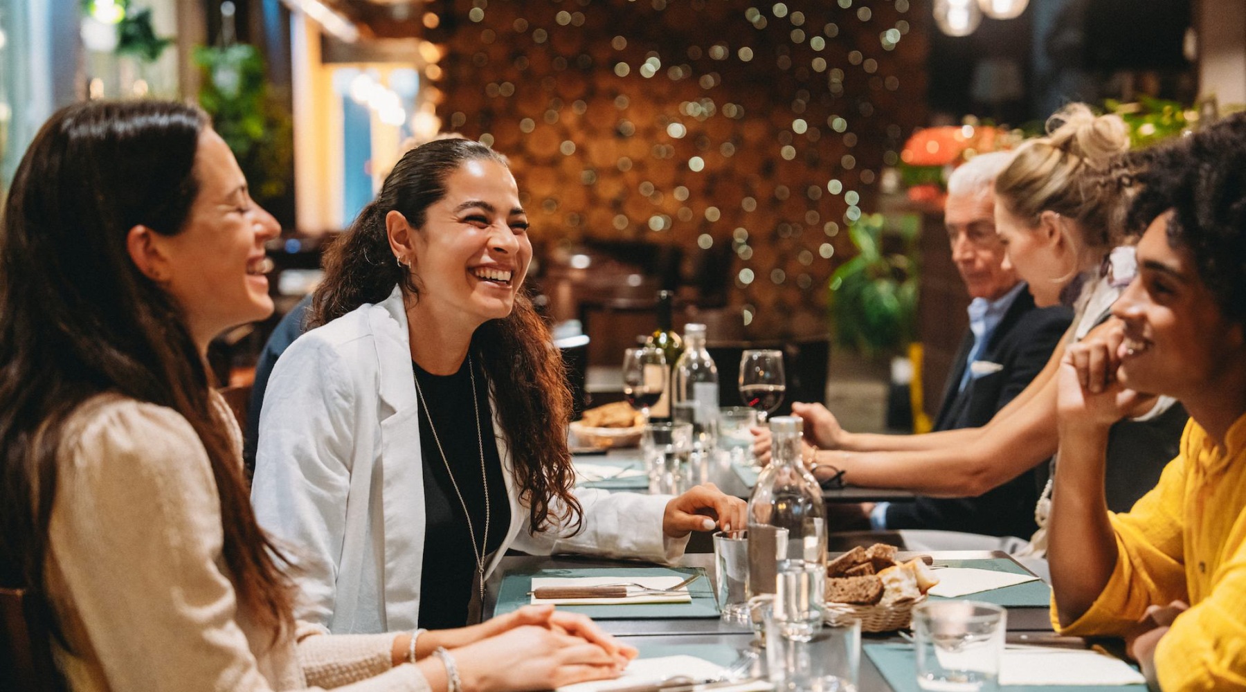 a group of people sitting at a table