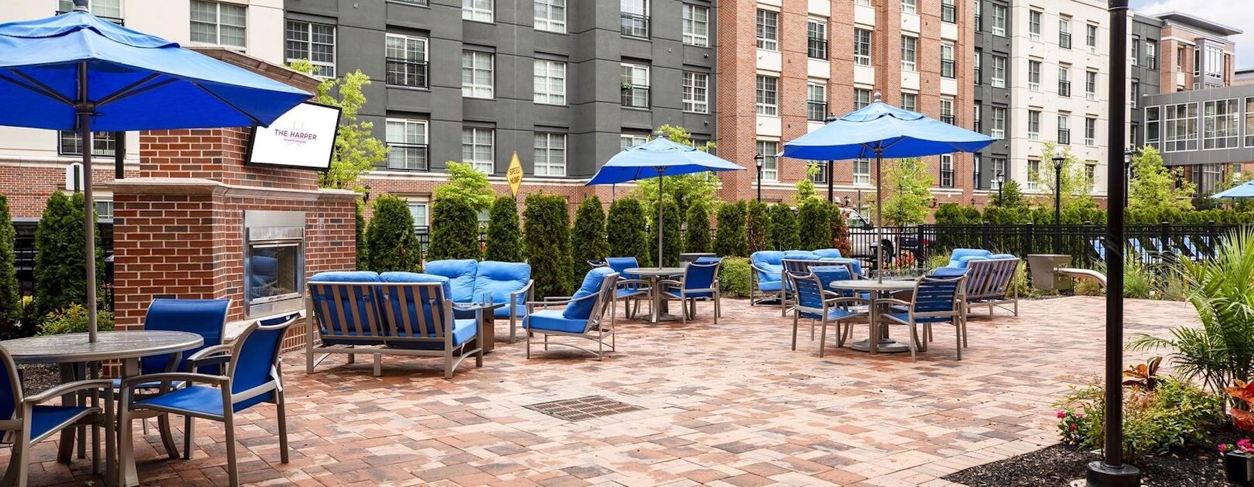 a group of tables and chairs outside